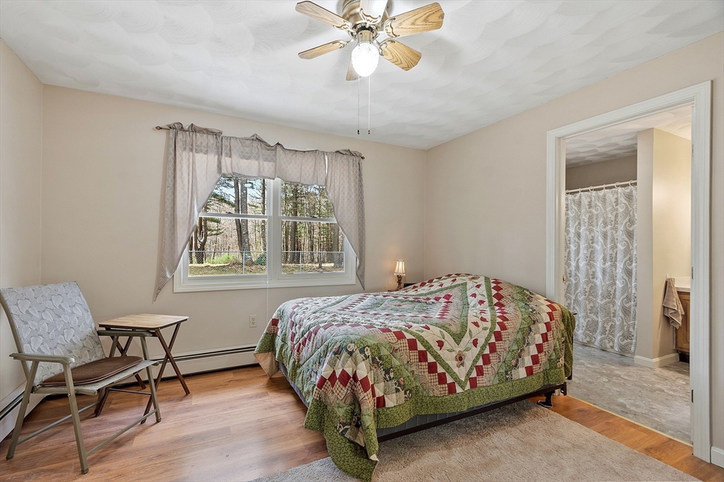 717 Old Petersham Road Barre, MA 01005 - Photo 23 of 40 a bedroom with a bed and window