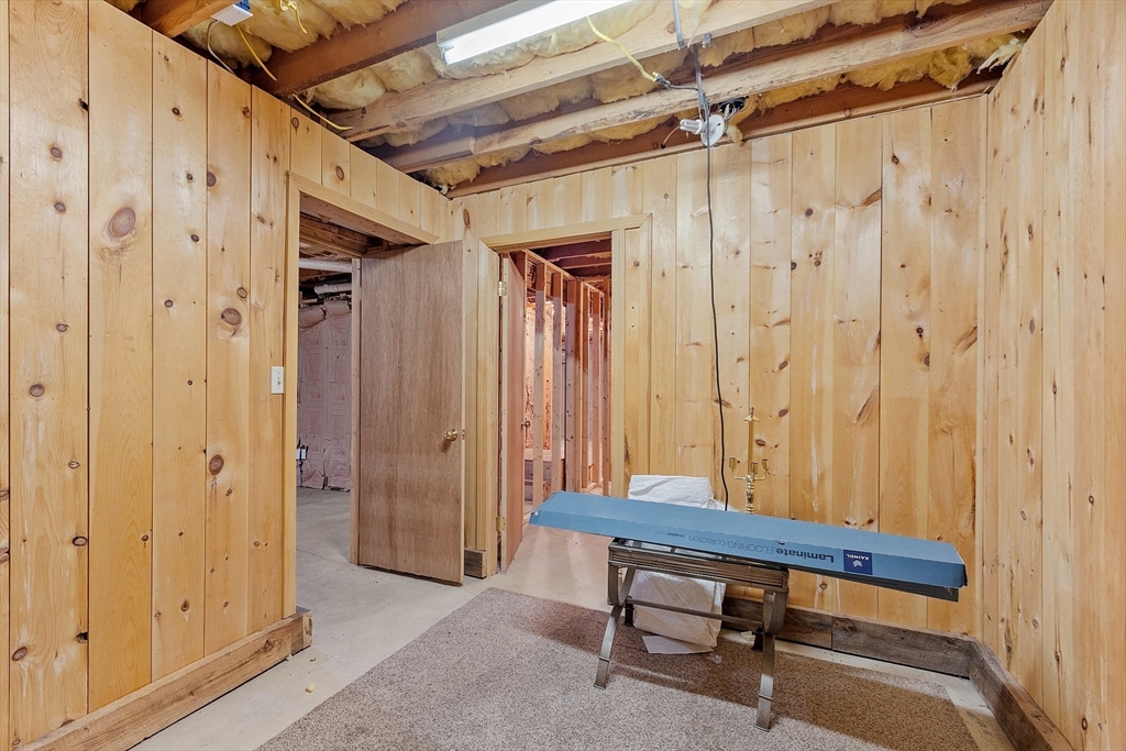 717 Old Petersham Road Barre, MA 01005 - Photo 33 of 40 a view of a room with furniture and wooden walls