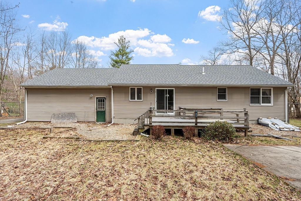 717 Old Petersham Road Barre, MA 01005 - Photo 37 of 40 a backyard of a house with table and chairs