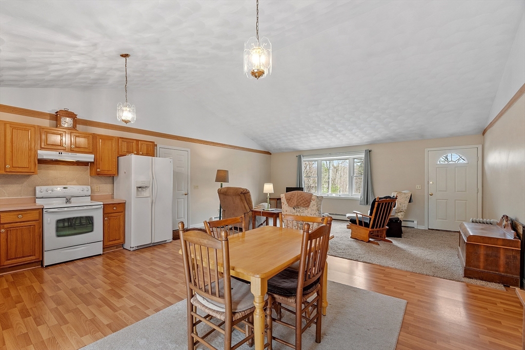 717 Old Petersham Road Barre, MA 01005 - Photo 10 of 40 a view of a dining room with furniture window and wooden floor
