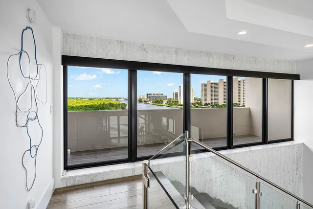 a room with a bed and a flat screen tv