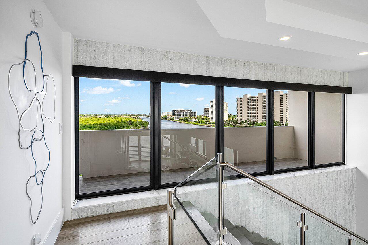 900 Northeast Spanish River Boulevard, Unit 7E Boca Raton, FL 33431 - Photo 26 of 71 a view of a floor to ceiling window in an empty room