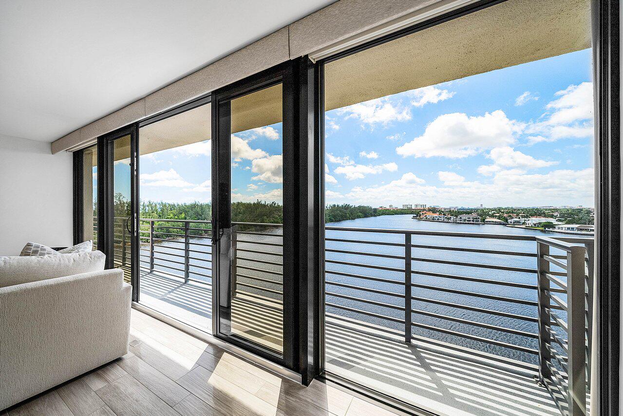 900 Northeast Spanish River Boulevard, Unit 7E Boca Raton, FL 33431 - Photo 37 of 71 a view of a balcony with furniture