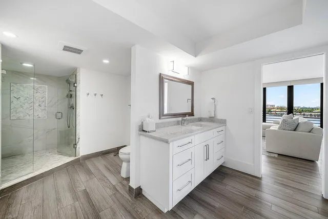 a view of a swimming pool with a lounge chairs