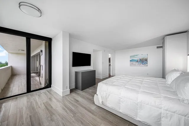 an aerial view of a city with lawn chairs