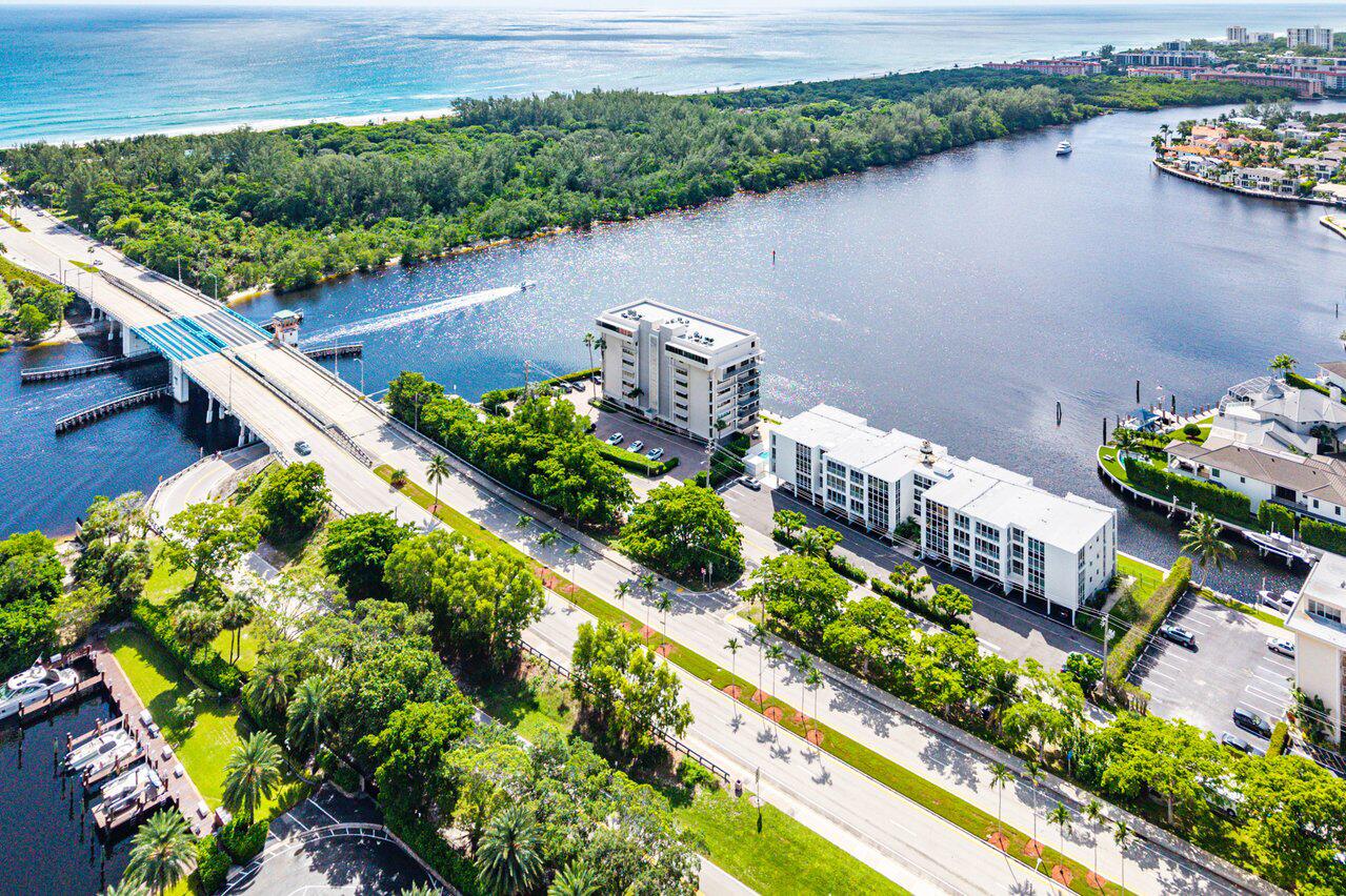 900 Northeast Spanish River Boulevard, Unit 7E Boca Raton, FL 33431 - Photo 65 of 71 an aerial view of a house with a lake view