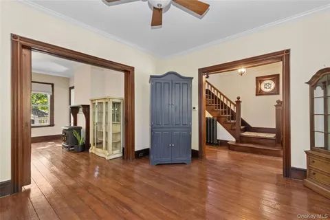 a view of an entryway with wooden floor