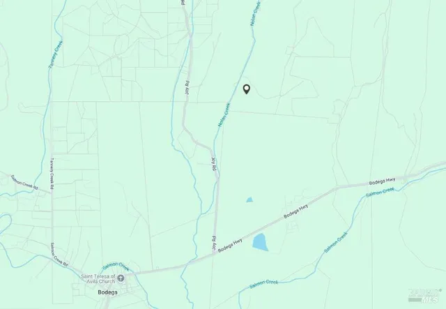 a view of a lake with a big yard