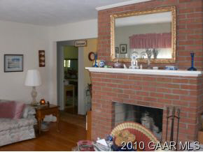111 Robinhood Road Staunton, VA 24401 - Photo 3 of 5 a living room with furniture and a fireplace