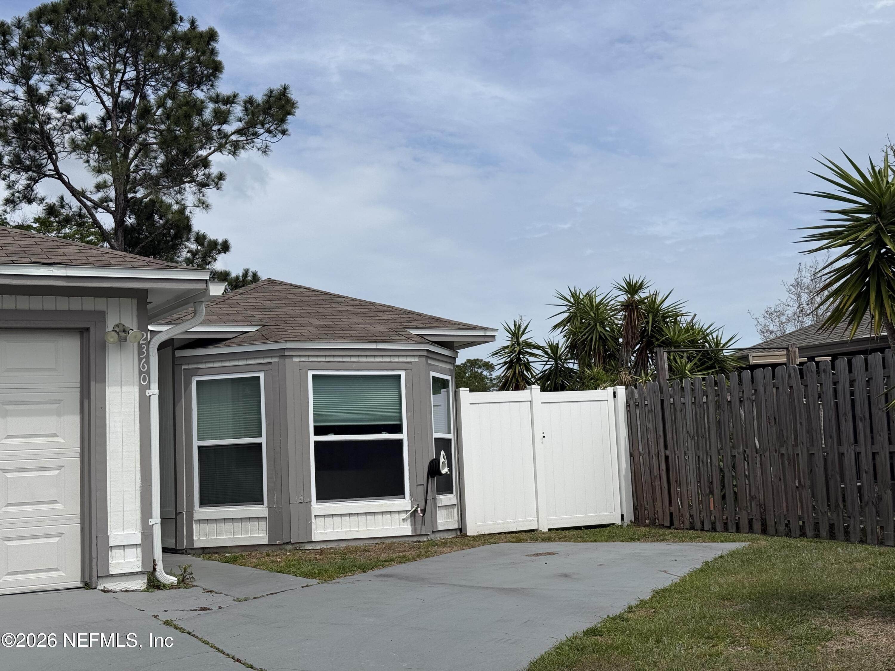2360 Bitternut Way Jacksonville, FL 32246 - Photo 3 of 25 a view of a house with a garage