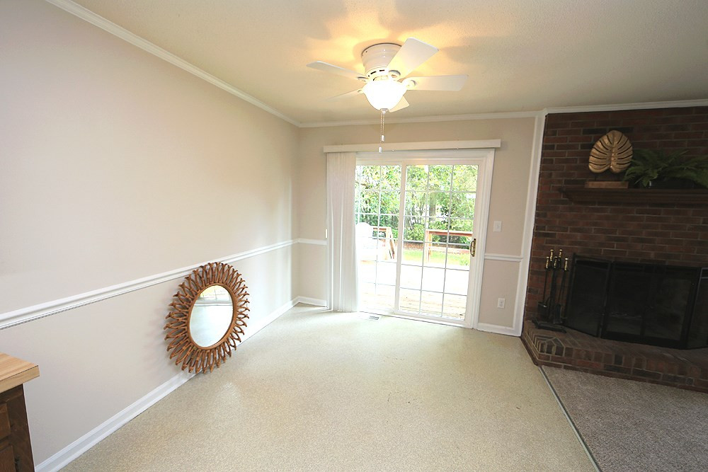 1024 Robinfield Drive Raleigh, NC 27603 - Photo 10 of 26 Sliding doors allow plenty of sunlight in the Dining Room.