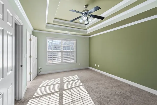 a bathroom with a granite countertop sink mirror and a bathtub with shower