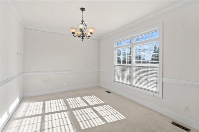 a view of a storage & utility room with a sink
