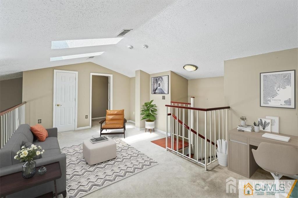 834 Edpas Road New Brunswick, NJ 08901 - Photo 15 of 20 a living room with furniture and wooden floor