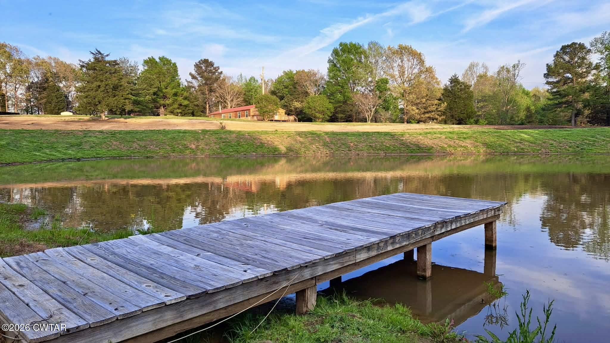 3540 Mt Carmel Road Camden, TN 38320 - Photo 2 of 29 View of home from pond