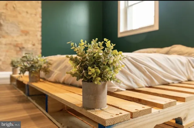 a vase of flowers sitting on a table