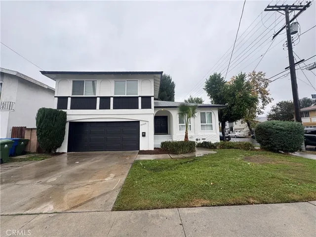 a front view of house with yard