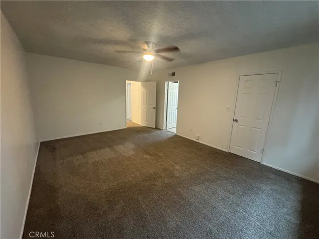 a bathroom with a sink a toilet and vanity