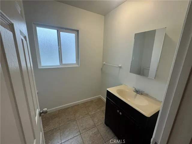 a bathroom with a shower and a toilet