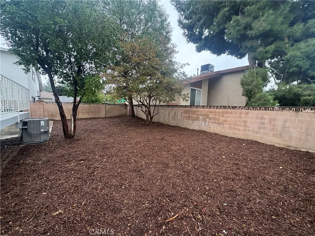 a view of balcony with deck and wooden floor