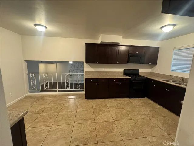 a living room with a couch and a flat screen tv