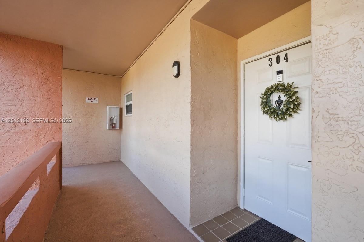 8826 West McNab Road, Unit 304 Tamarac, FL 33321 - Photo 1 of 22 a view of bathroom with shower