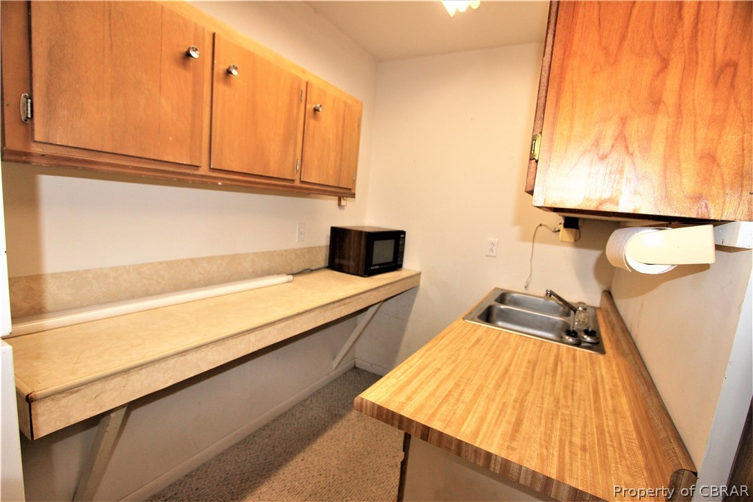 84 Lanes Creek Road Hudgins, VA 23076 - Photo 10 of 45 View of guest cottage kitchen.