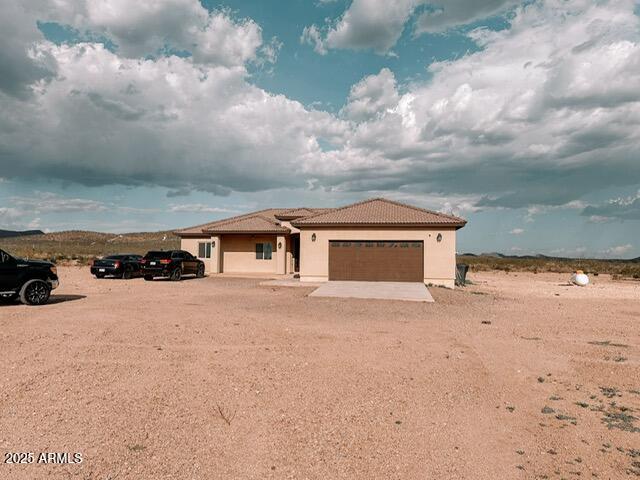 a view of a house with a snow in the yard