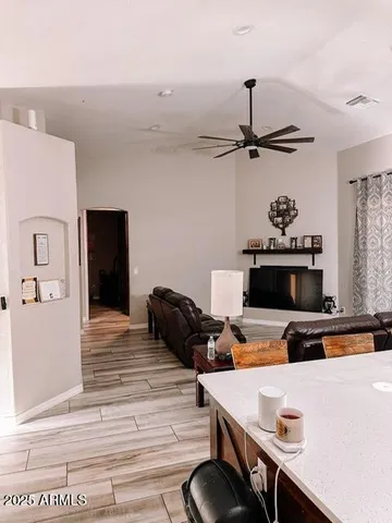 a room with furniture and flat screen tv