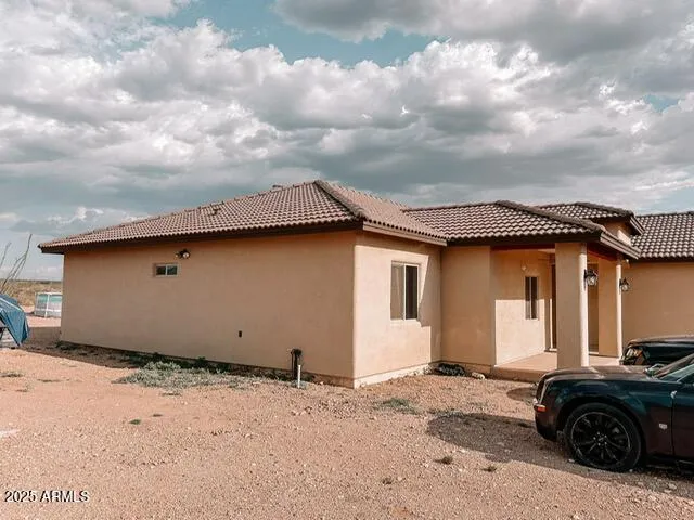 a house with trees in the background