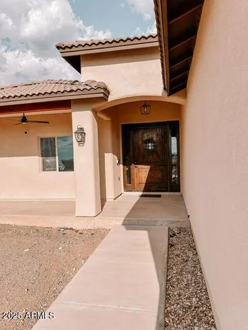 a front view of a house with a outdoor space