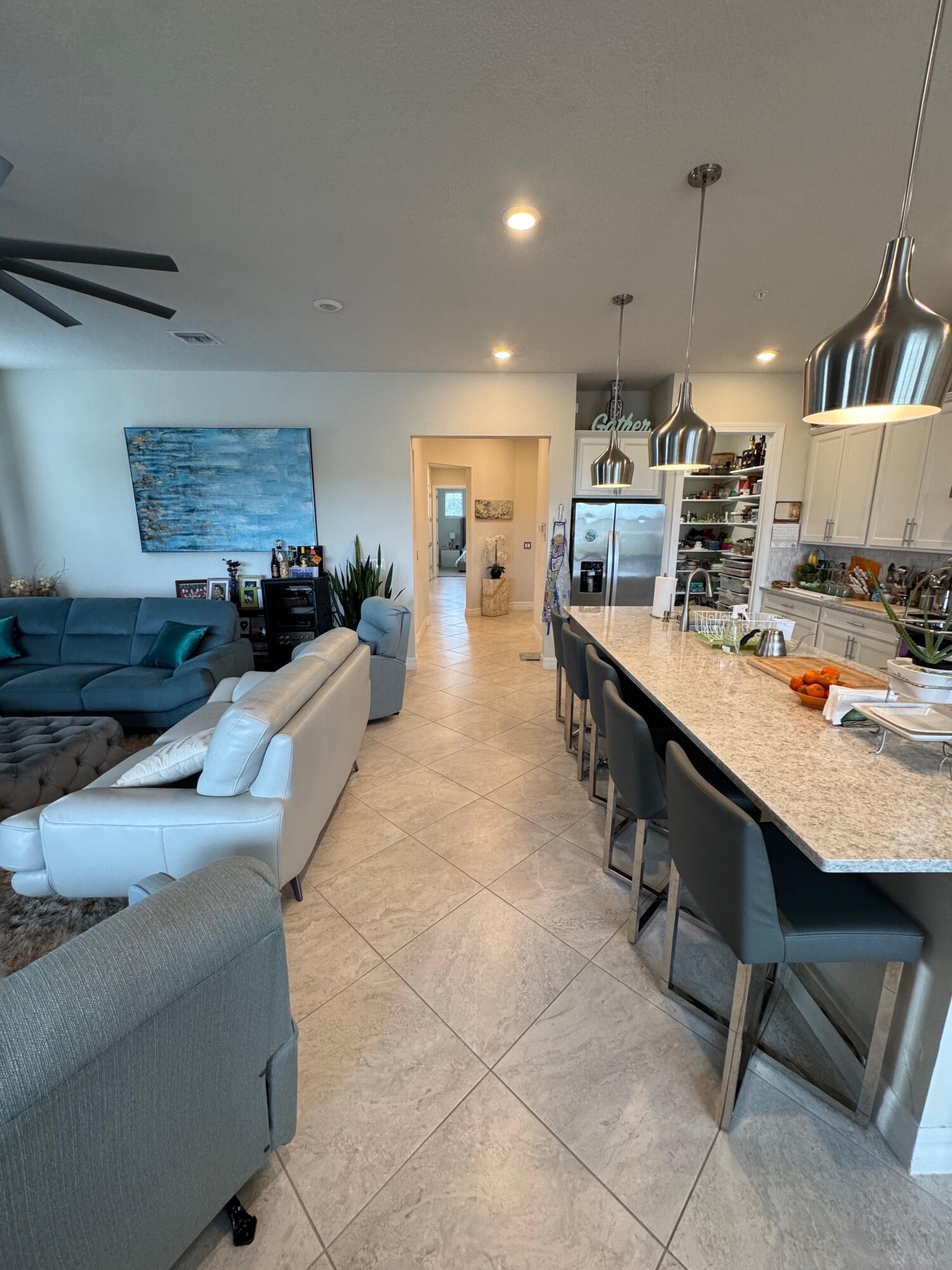 21872 Canadensis Circle, Unit 202 Boca Raton, FL 33428 - Photo 27 of 43 kitchen island