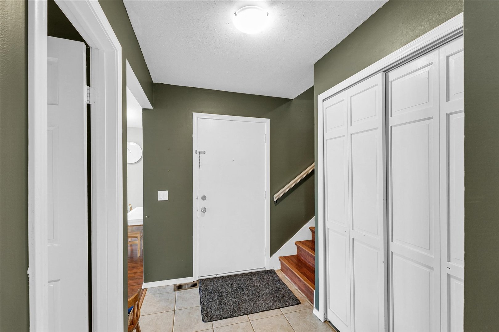 1727 Devonshire Drive Champaign, IL 61821 - Photo 13 of 48 a view of hallway with stairs and furniture
