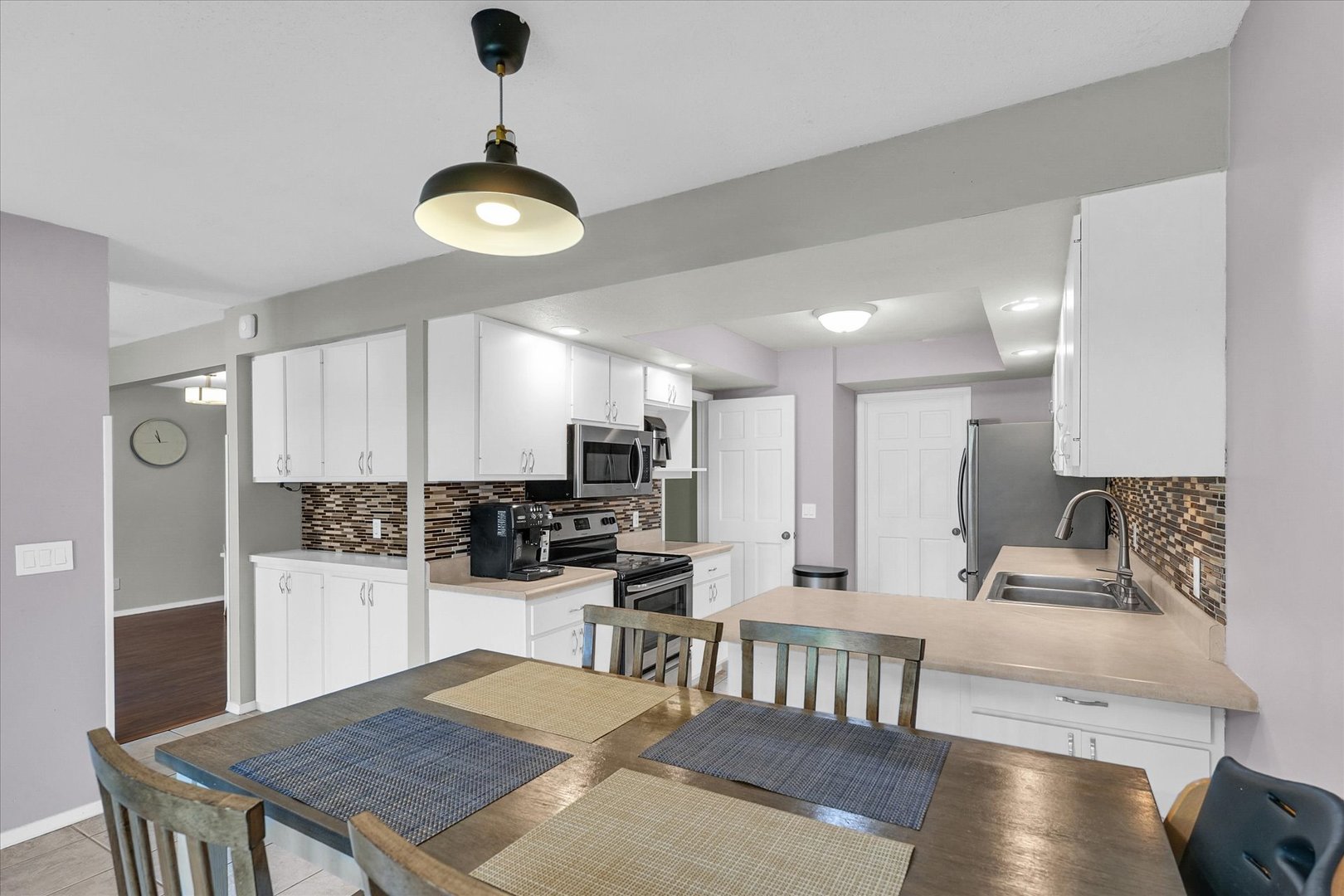 1727 Devonshire Drive Champaign, IL 61821 - Photo 23 of 48 a kitchen with counter space cabinets and appliances