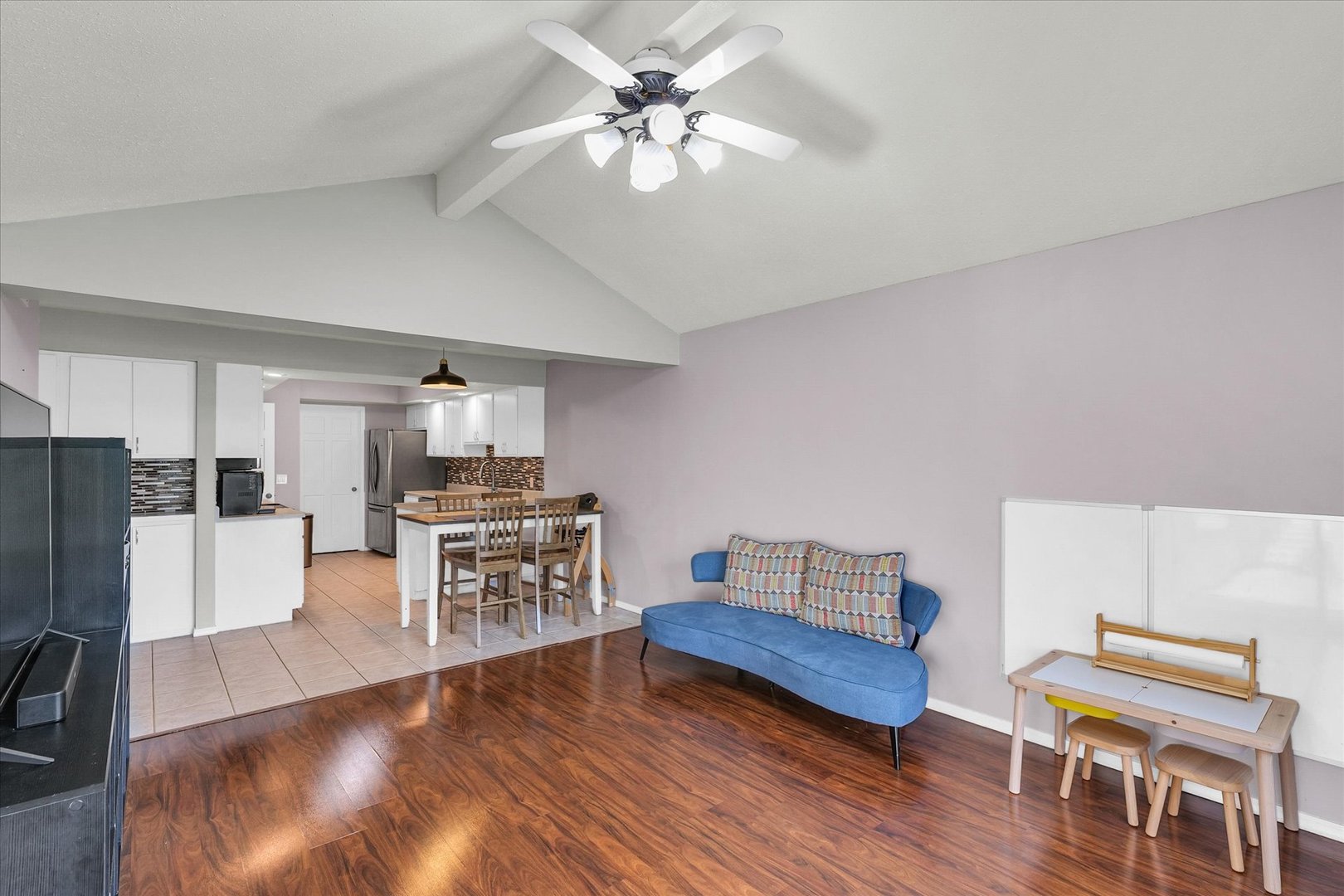 1727 Devonshire Drive Champaign, IL 61821 - Photo 26 of 48 a living room with furniture and a wooden floor