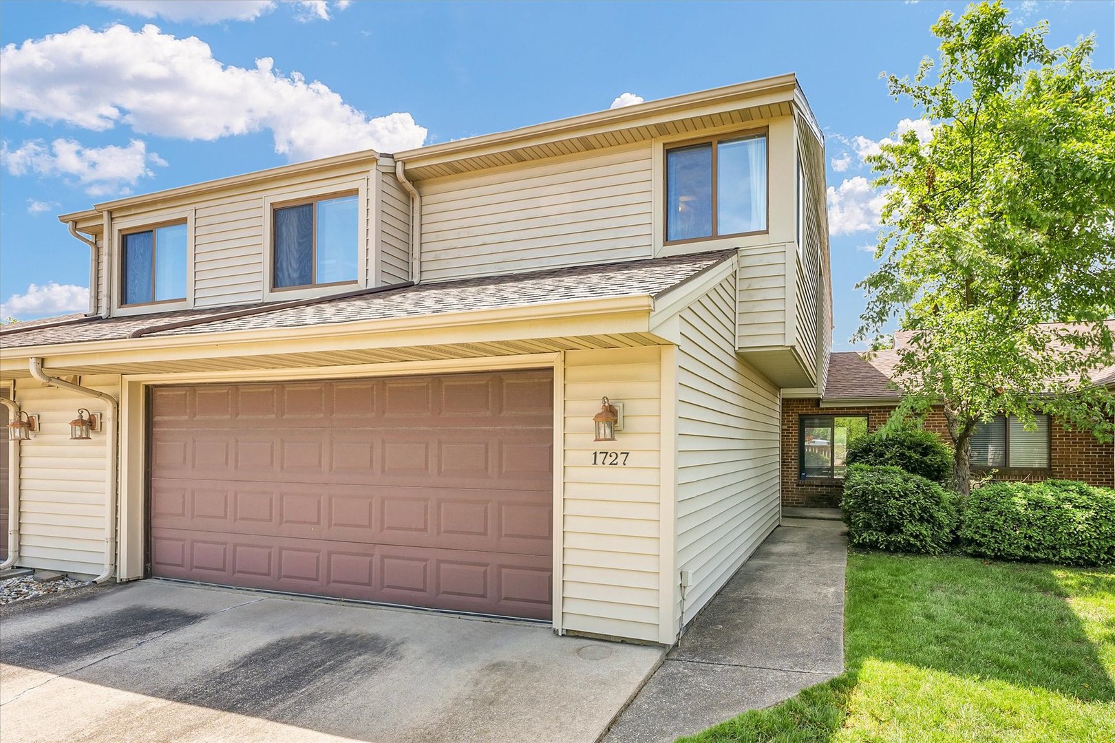 1727 Devonshire Drive Champaign, IL 61821 - Photo 3 of 48 a view of a house with a yard