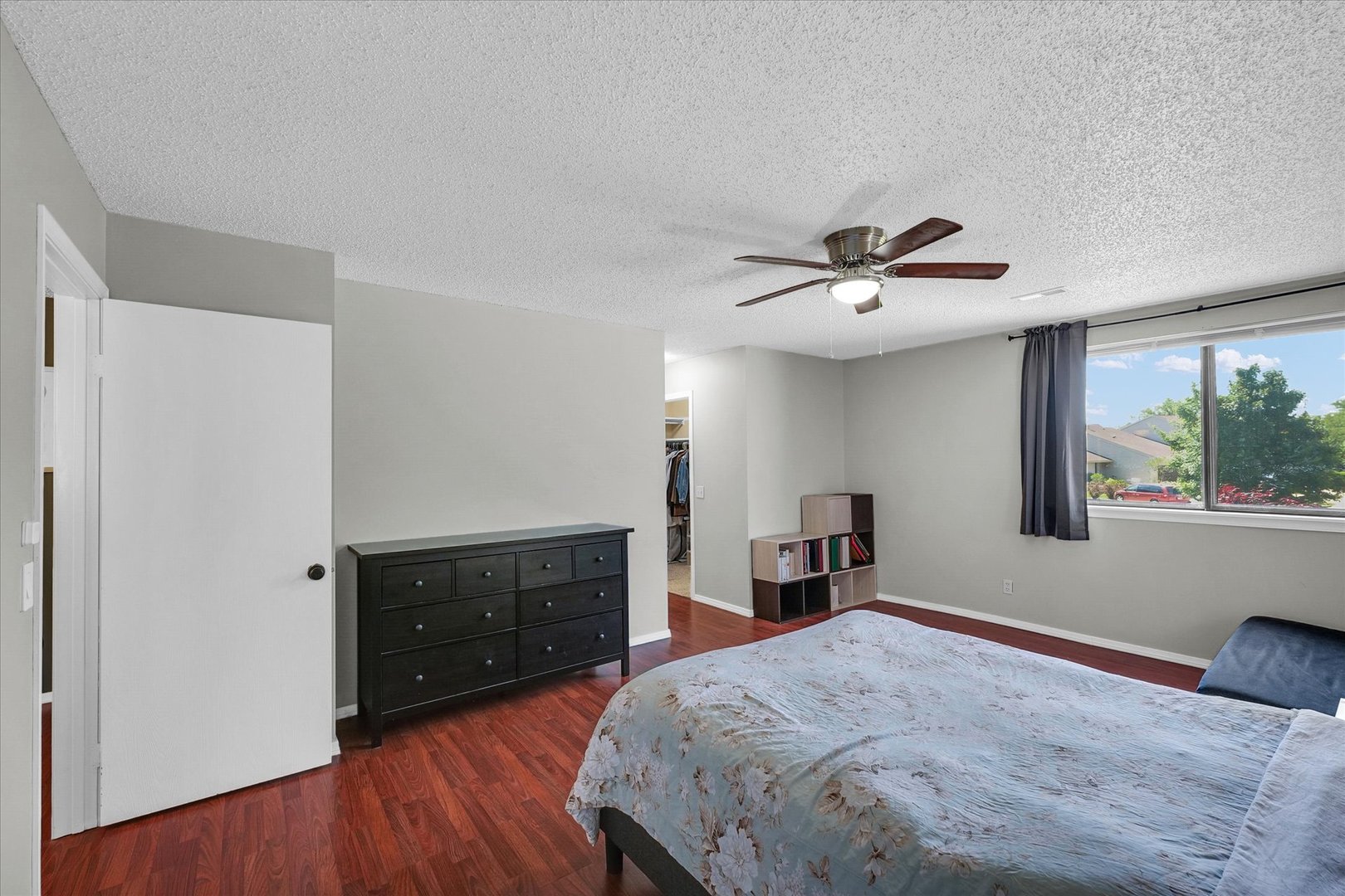 1727 Devonshire Drive Champaign, IL 61821 - Photo 32 of 48 a bed room with a bed and a ceiling fan