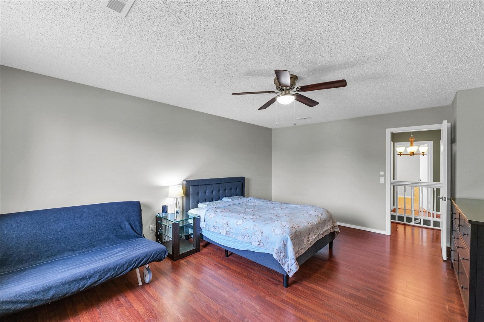 1727 Devonshire Drive Champaign, IL 61821 - Photo 37 of 48 a bedroom with a bed furniture and wooden floor