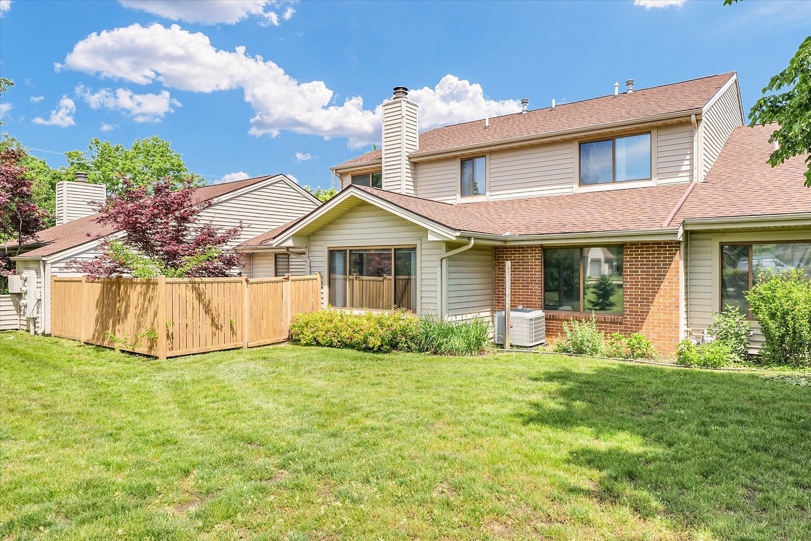 1727 Devonshire Drive Champaign, IL 61821 - Photo 43 of 48 a view of a house with a yard