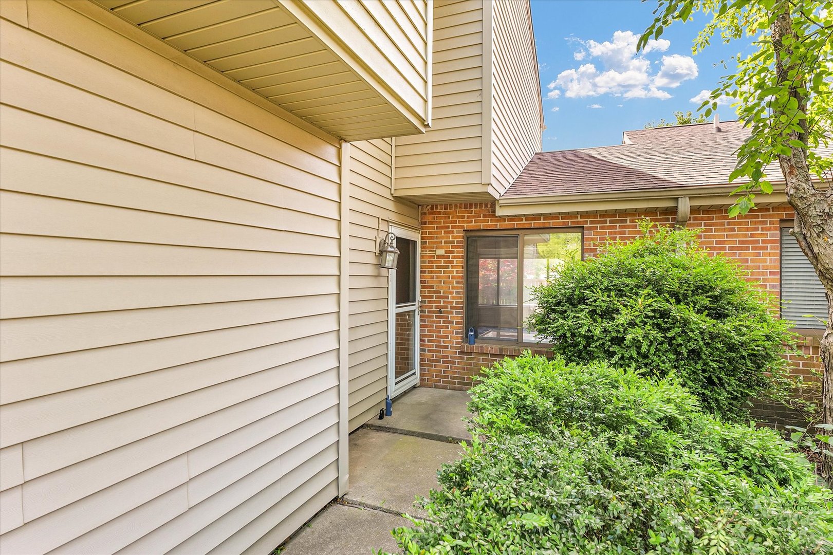 1727 Devonshire Drive Champaign, IL 61821 - Photo 5 of 48 a view of a house with a door