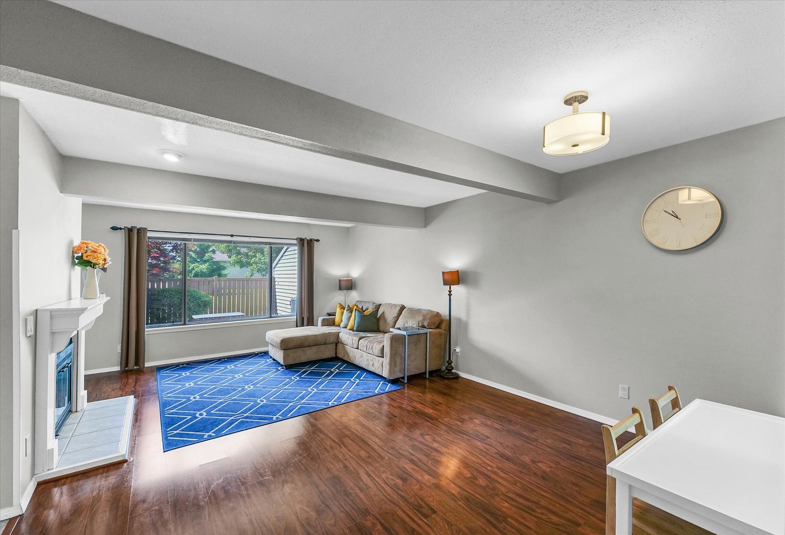 1727 Devonshire Drive Champaign, IL 61821 - Photo 7 of 48 a living room with furniture and a large window