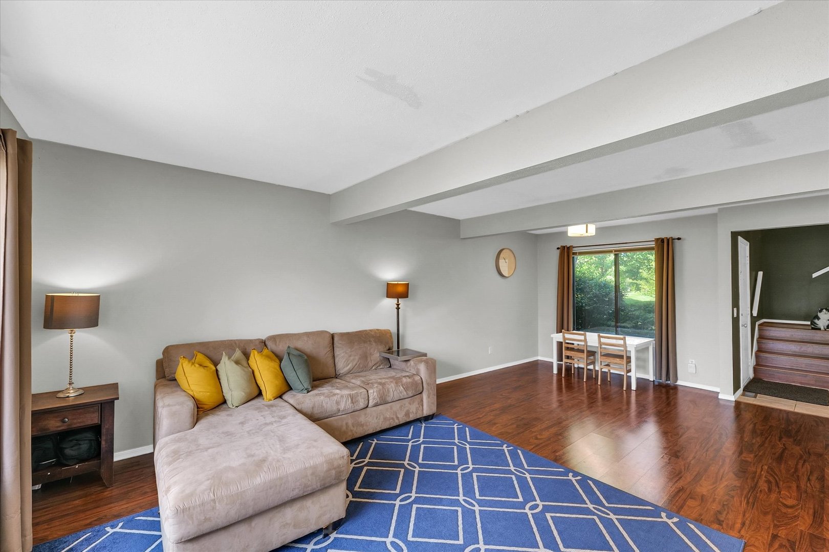 1727 Devonshire Drive Champaign, IL 61821 - Photo 9 of 48 a living room with furniture and a wooden floor