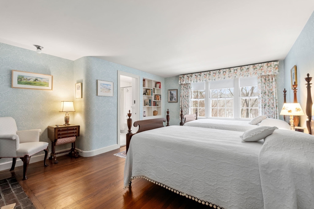 27 Laurel Road Chestnut Hill, MA 02467 - Photo 11 of 20 a bedroom with a large bed and a window