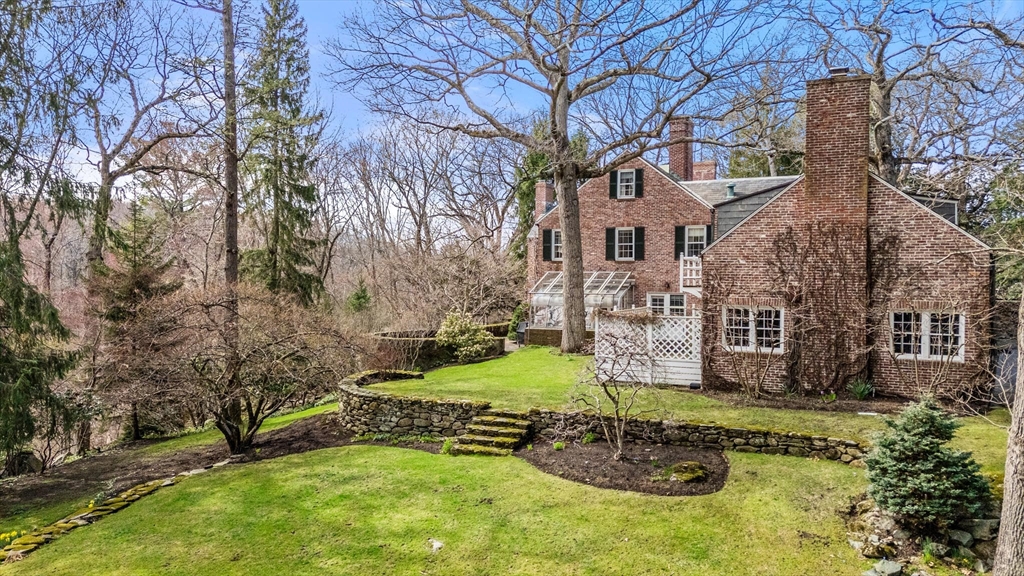 27 Laurel Road Chestnut Hill, MA 02467 - Photo 17 of 20 a view of a house with a yard