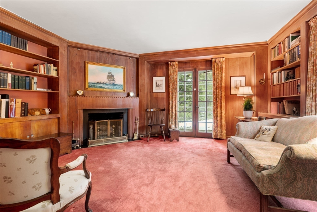 27 Laurel Road Chestnut Hill, MA 02467 - Photo 3 of 20 a living room with furniture and a fireplace
