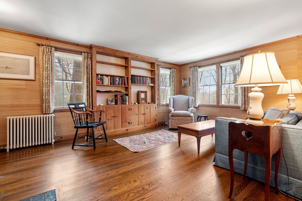 27 Laurel Road Chestnut Hill, MA 02467 - Photo 4 of 20 a living room with furniture floor to ceiling window and wooden floor