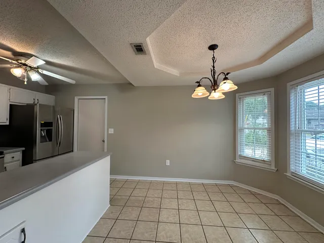 a view of an empty room with window