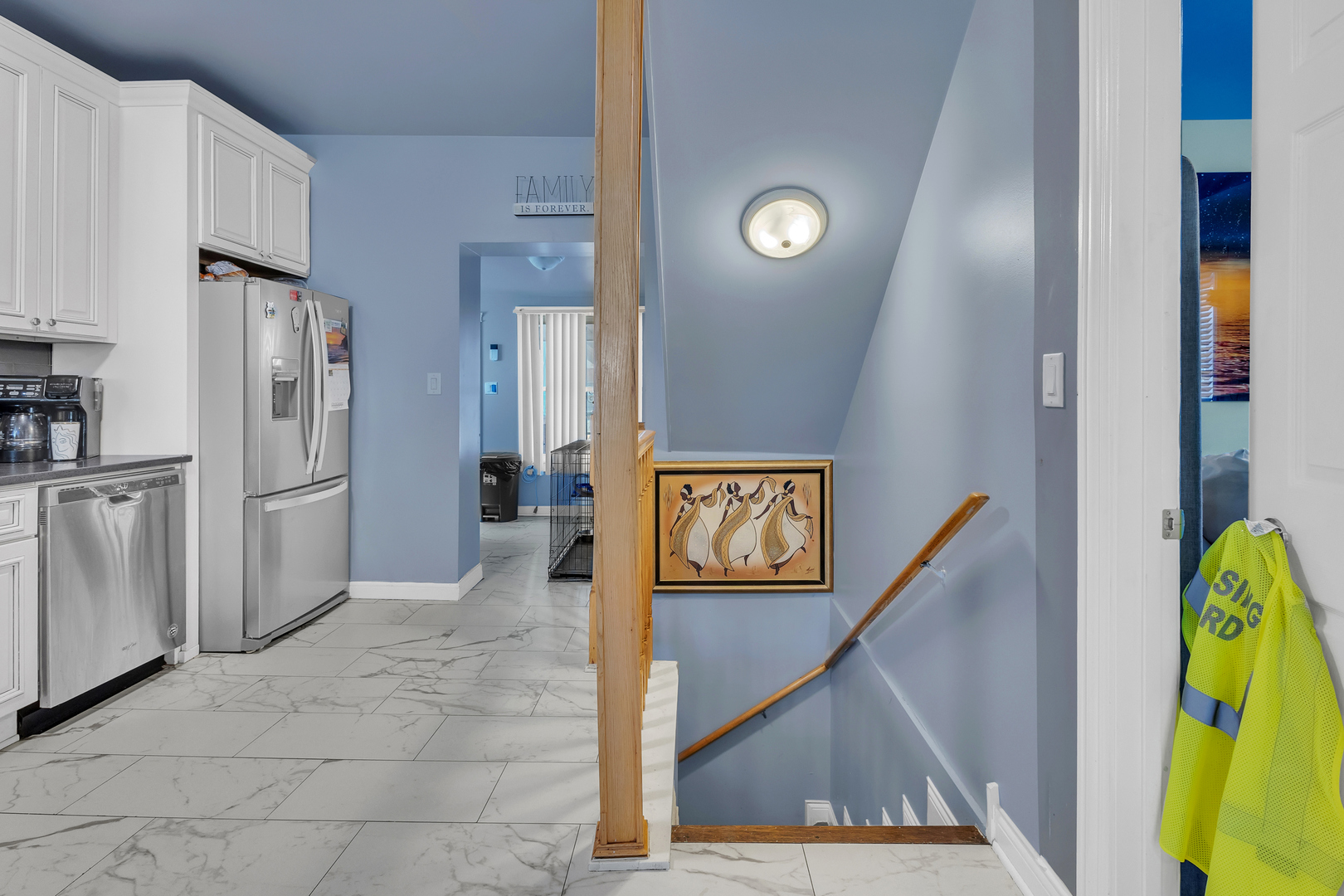 1418 North Mayfield Avenue Chicago, IL 60651 - Photo 15 of 28 a view of a hallway with entryway a kitchen view and wooden floor