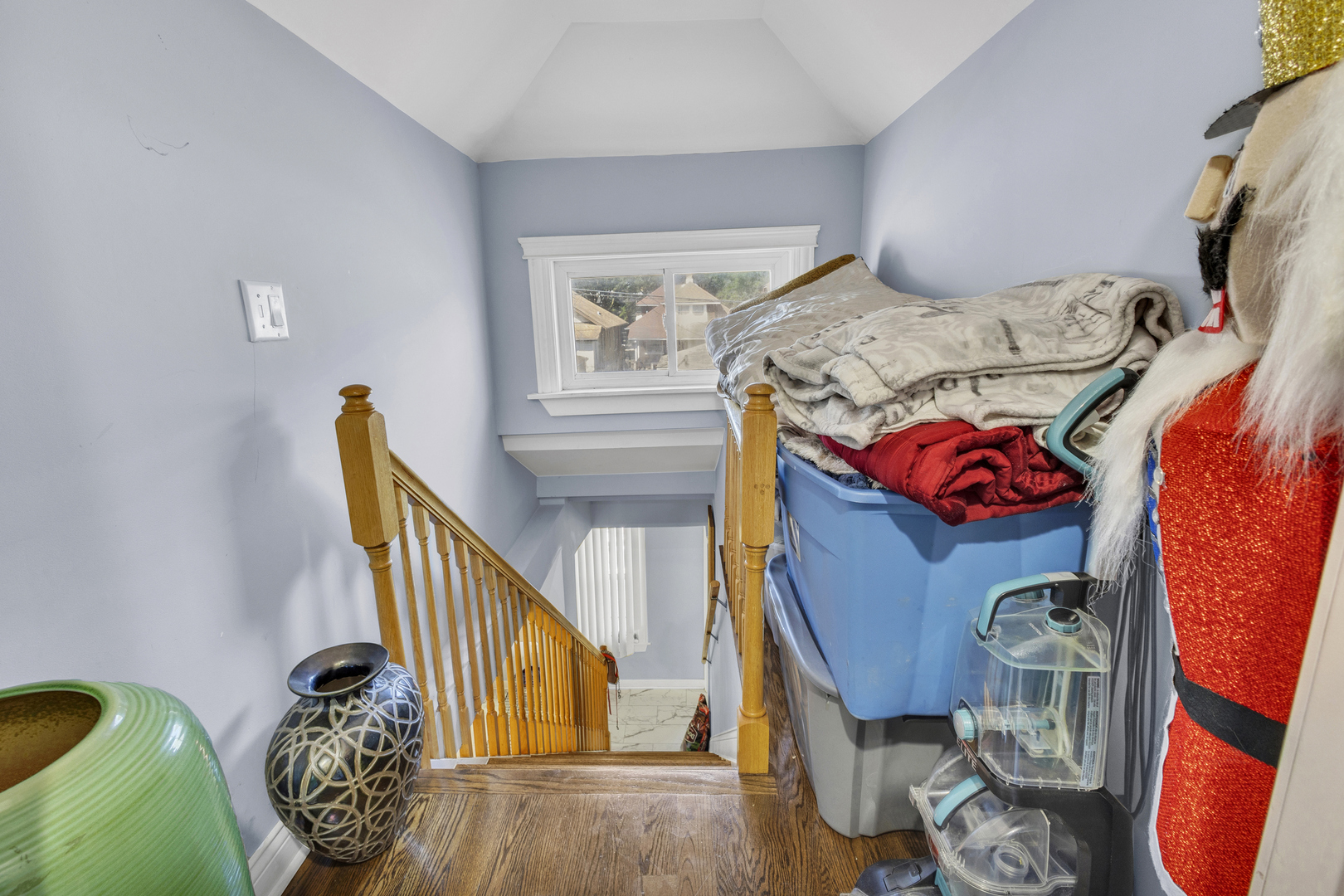 1418 North Mayfield Avenue Chicago, IL 60651 - Photo 7 of 28 a view of walk in closet with clothes and shoes