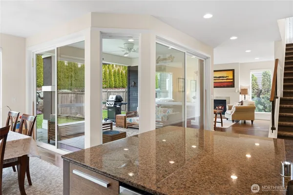 a view of a living room and dining room